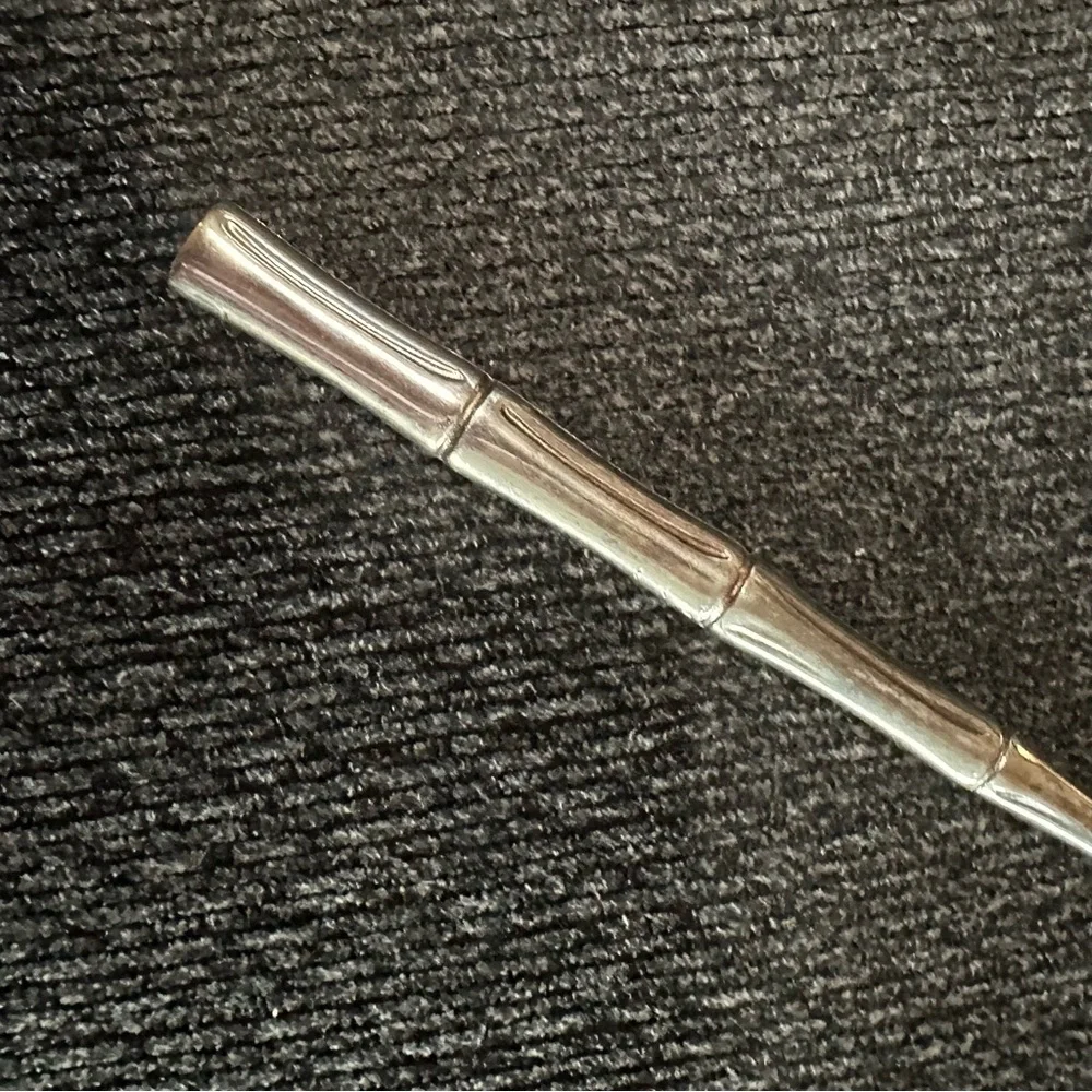 vintage Italian silverplate salad server with a bamboo-style handle